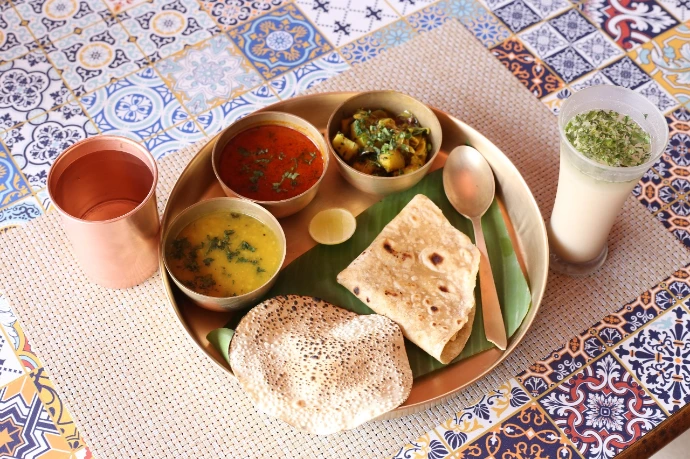Balanced Ayurvedic sattvic thali with dal, roti and vegetables served at Tapasya Health & Wellness