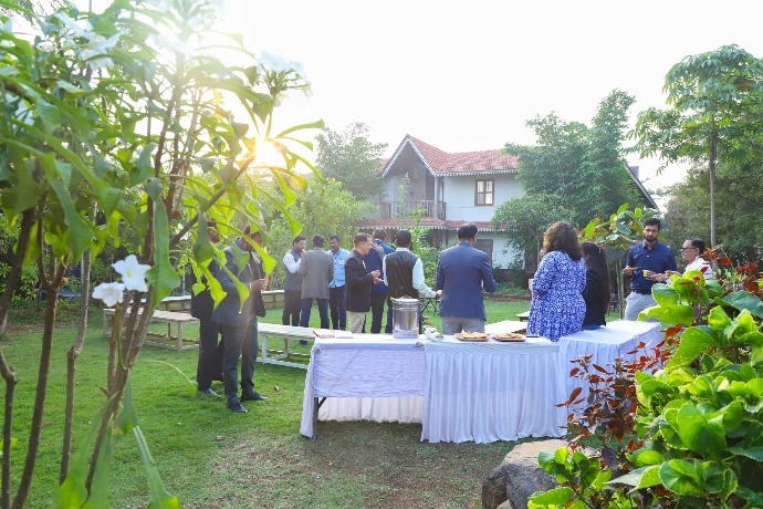 Outdoor garden dinner setup for individuals at Tapasya Health & Wellness wellness retreat