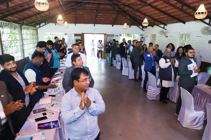 Interactive corporate wellness workshop with participants at Tapasya Health & Wellness pavilion